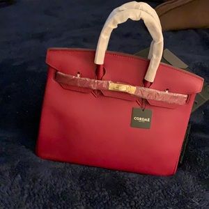 Brand new Cordae read satchel size 35